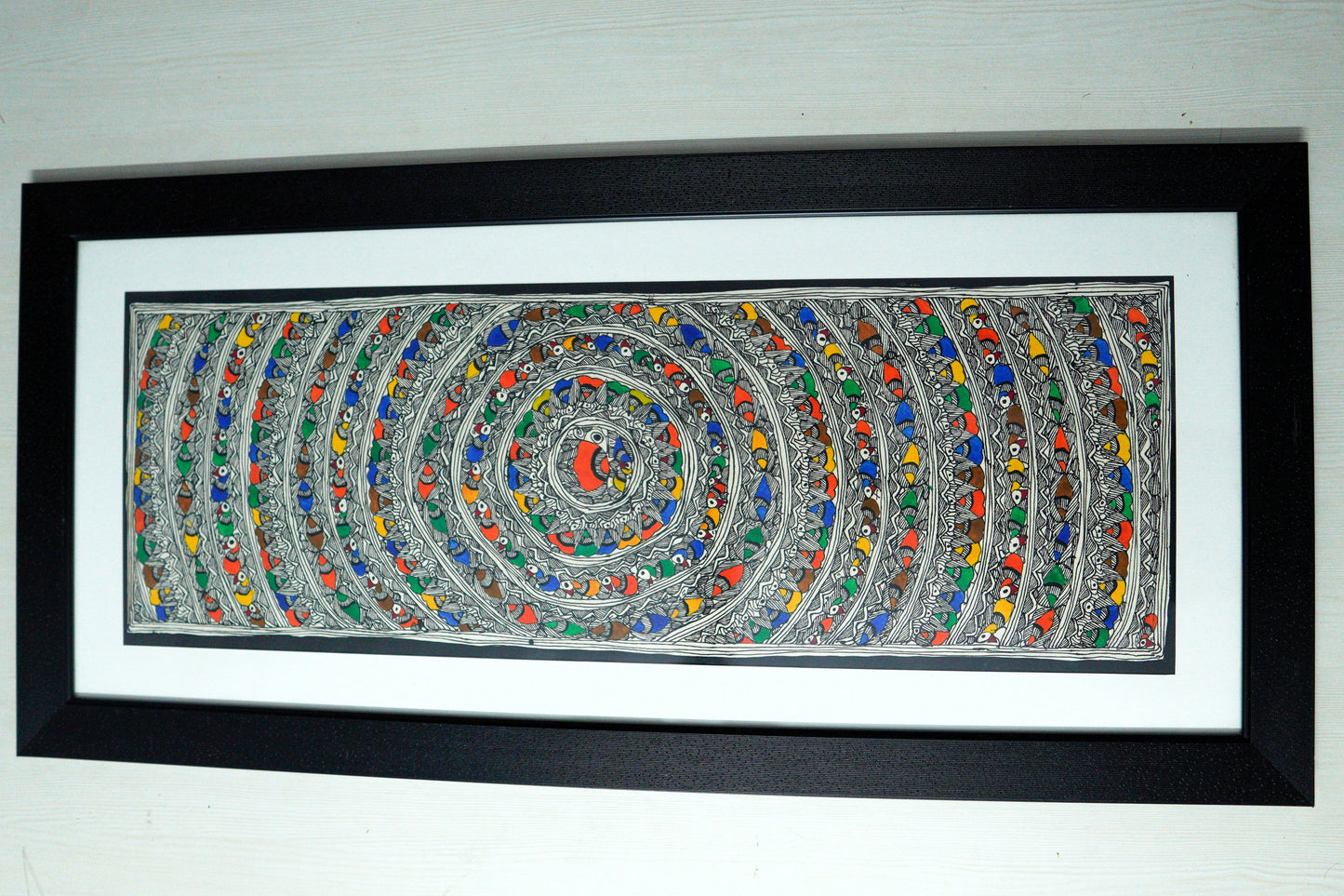 Handmade Madhubani Circular Mandala Painting – Vibrant Folk Art on Paper (Framed) | Suchitra Hastkala